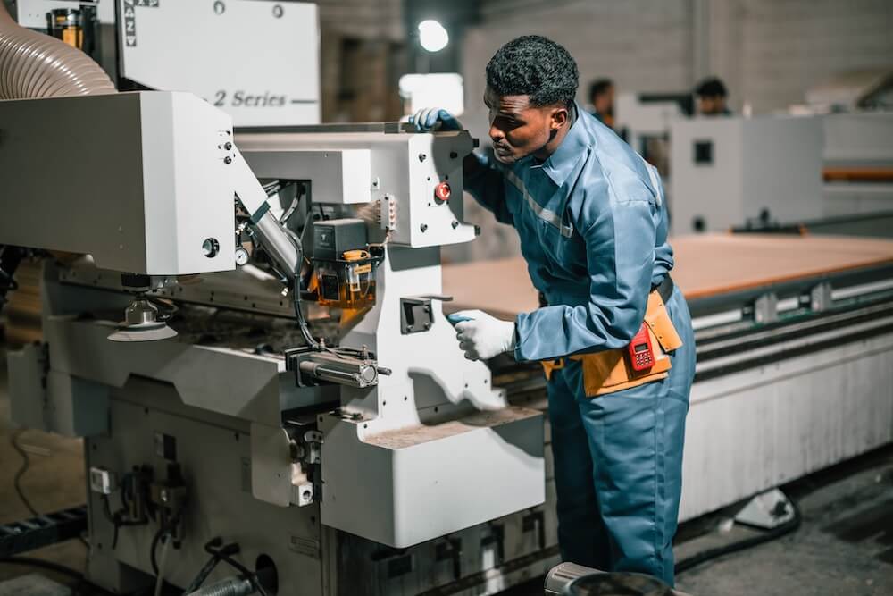 Man working at a manufacturing business that is preparing to sell